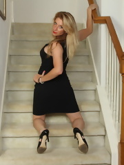 Steamy American MILF playing on the stairway