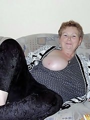 Mature wife spreading pussy